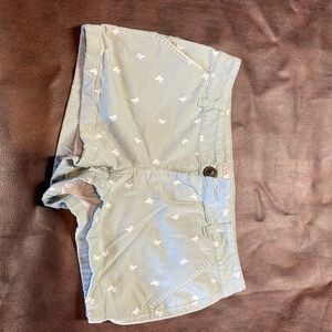 So size 5 shorts  that are green with cactus on it.